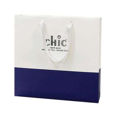 Sacos de compras de papel Tote Estampagem de prata com alças para roupas Vestuário