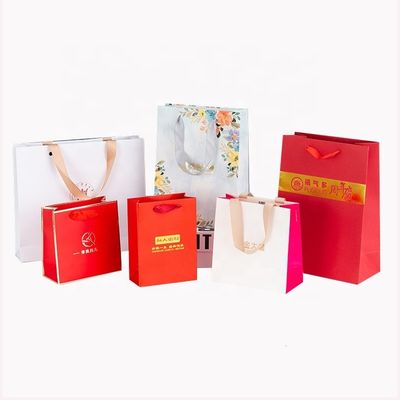 Encomenda personalizada aceitável Logotipo de luxo Impresso Saco de compras para belo presente de férias