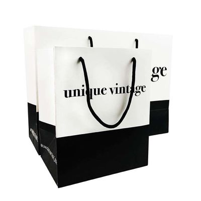 OEM Desenhos personalizados Luxo Matte presente Bolsa de papel de compras com logotipo para calçados de roupa