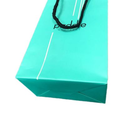 Saco de compras de presente de papel verde mate de luxo para embalagens de roupas
