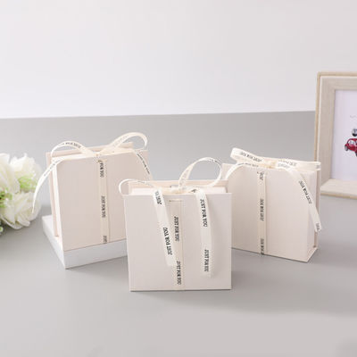 Logotipo de fita branca Caixa de presente dobrável Maquiagem Vestuário Acessórios Papelão rígido com laminação brilhante