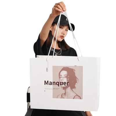 Bolsas de compras de luxo de papel branco personalizadas com design de alça de fita