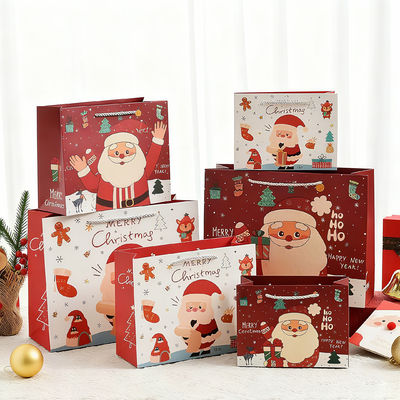 Tamanhos personalizados Bolsas de Natal Kraft Impresas Bolsas de presente de luxo com alça de fita