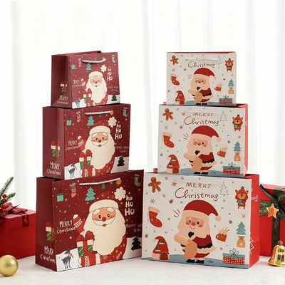Tamanhos personalizados Bolsas de Natal Kraft Impresas Bolsas de presente de luxo com alça de fita